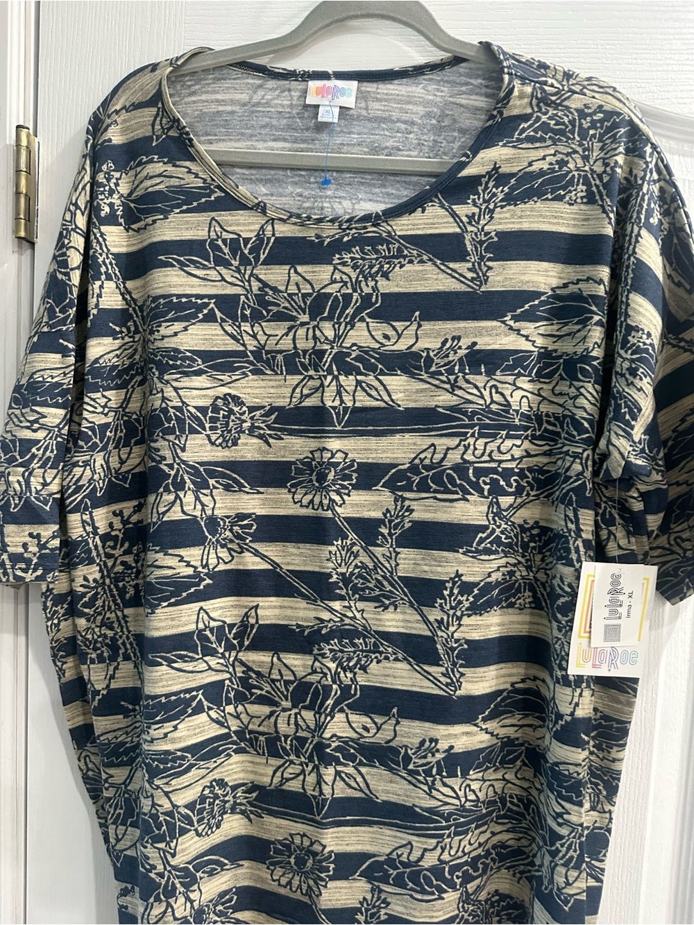 LuLaRoe Navy and Cream Striped Floral Short Sleeve Top